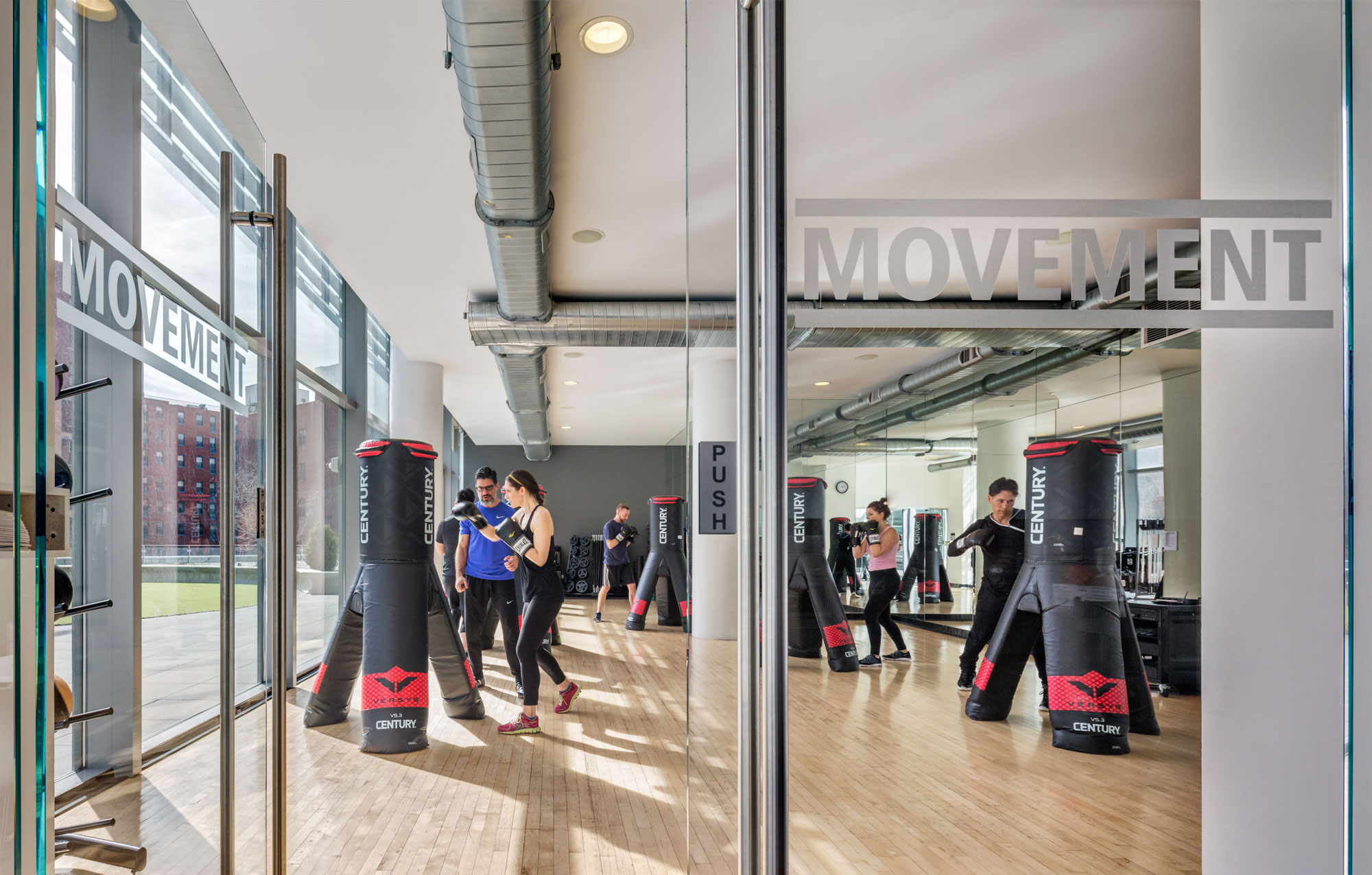 a group of people standing in front of a building