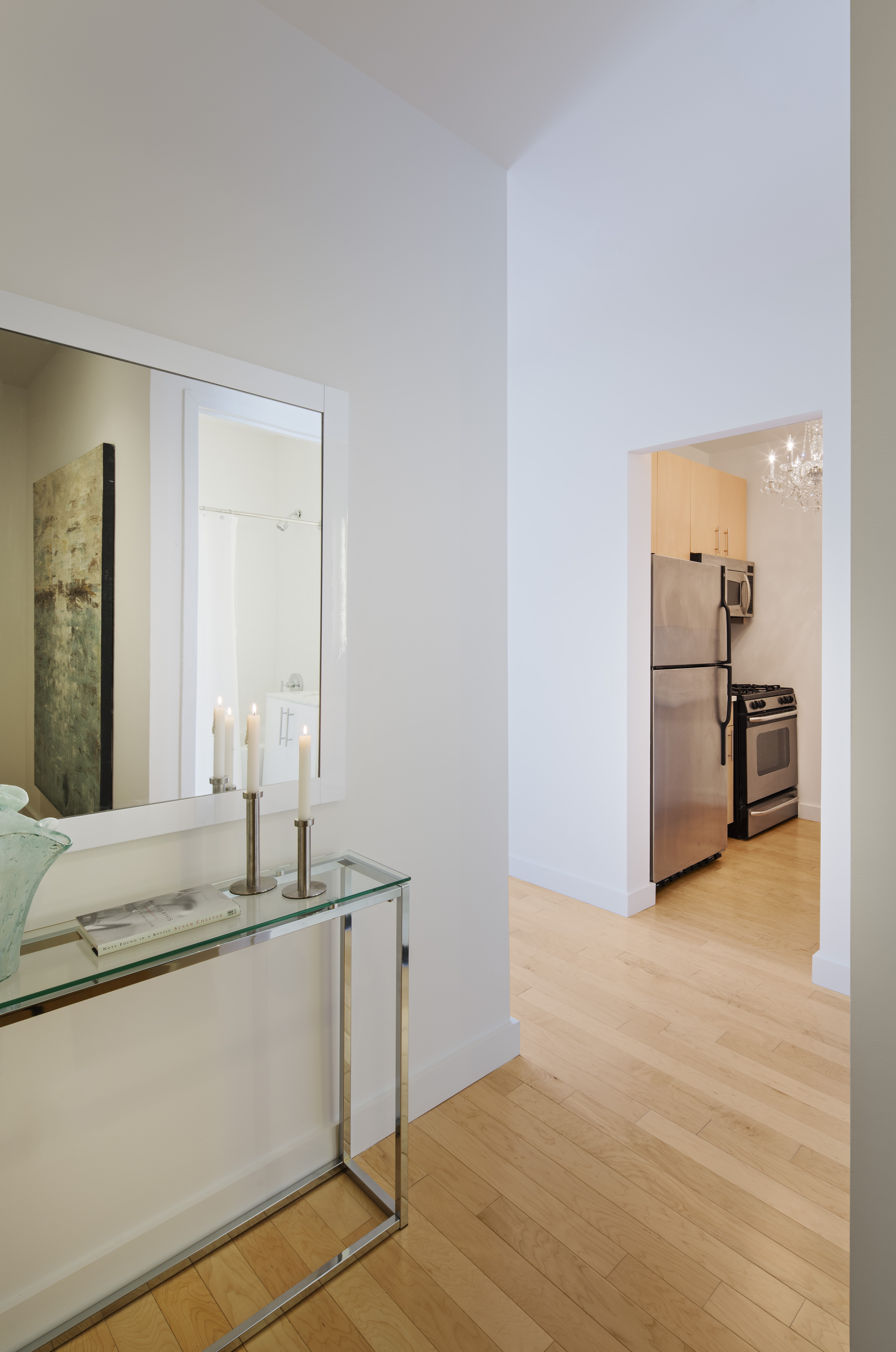 a bedroom with a large mirror
