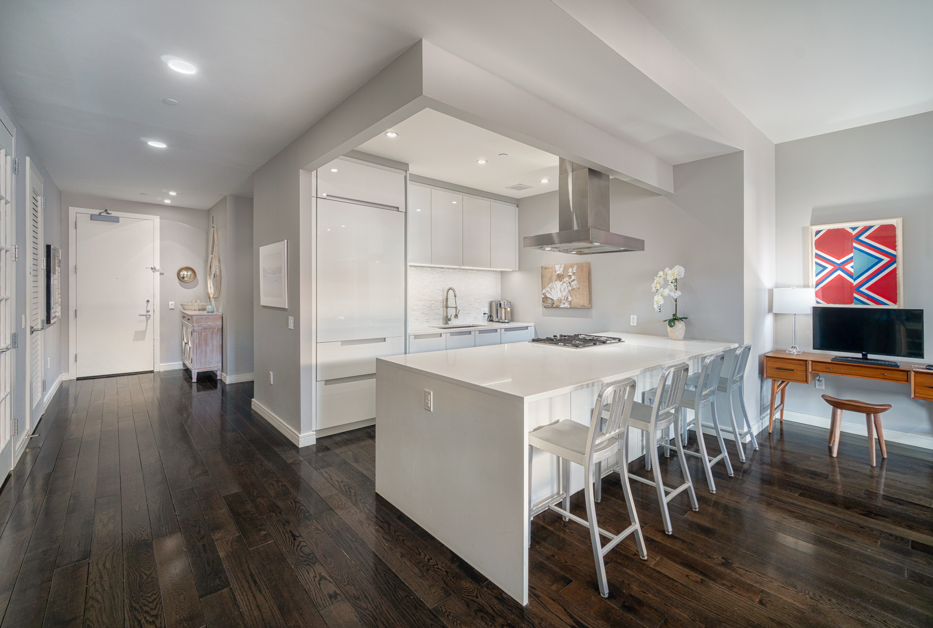 250 WEST ST 8F Manhattan, New York In TriBeCa's landmark historic district, this 2 bedroom, 3-bathroom, luxury home with an office is spectacular with a great layout and modern finishes. You enter through a long hallway into the stunning open concept kitchen and living space. The apartment brandishes 10-foot ceilings, 5-inch plank oak floors, an open concept living room, chef's kitchen with Poggenpohl cabinetry, white quartz countertops, imported glass tile backsplash, Sub-Zero refrigerator, and Bosch stove, range and dishwasher. The master suite has an oversized custom walk-in closet and the marble clad master bath sports a walk-in shower, 6-foot Catalina soaking tub, and porcelain dual sinks. The second bedroom is spacious and has an on-suite bathroom. The home office/accessory space (currently setup as a nursery) has French doors that provides privacy when needed and could easily accommodate a queen bed with room to spare to provide an additional sleeping space. The unit includes three full baths. The home comes complete with a Bosch washer and dryer and Sonos ready speakers. The 24/7 doorman building hosts impressive amenities including a fitness center, children's playroom, library, 61-foot pool, sauna, 5000 square foot common roof terrace with panoramic views, sundeck, lounge and dining area. The neighborhood offers some of the best restaurants in the city as well as the Hudson River waterfront (Piers 25 and 26) and close proximity to Whole Foods.