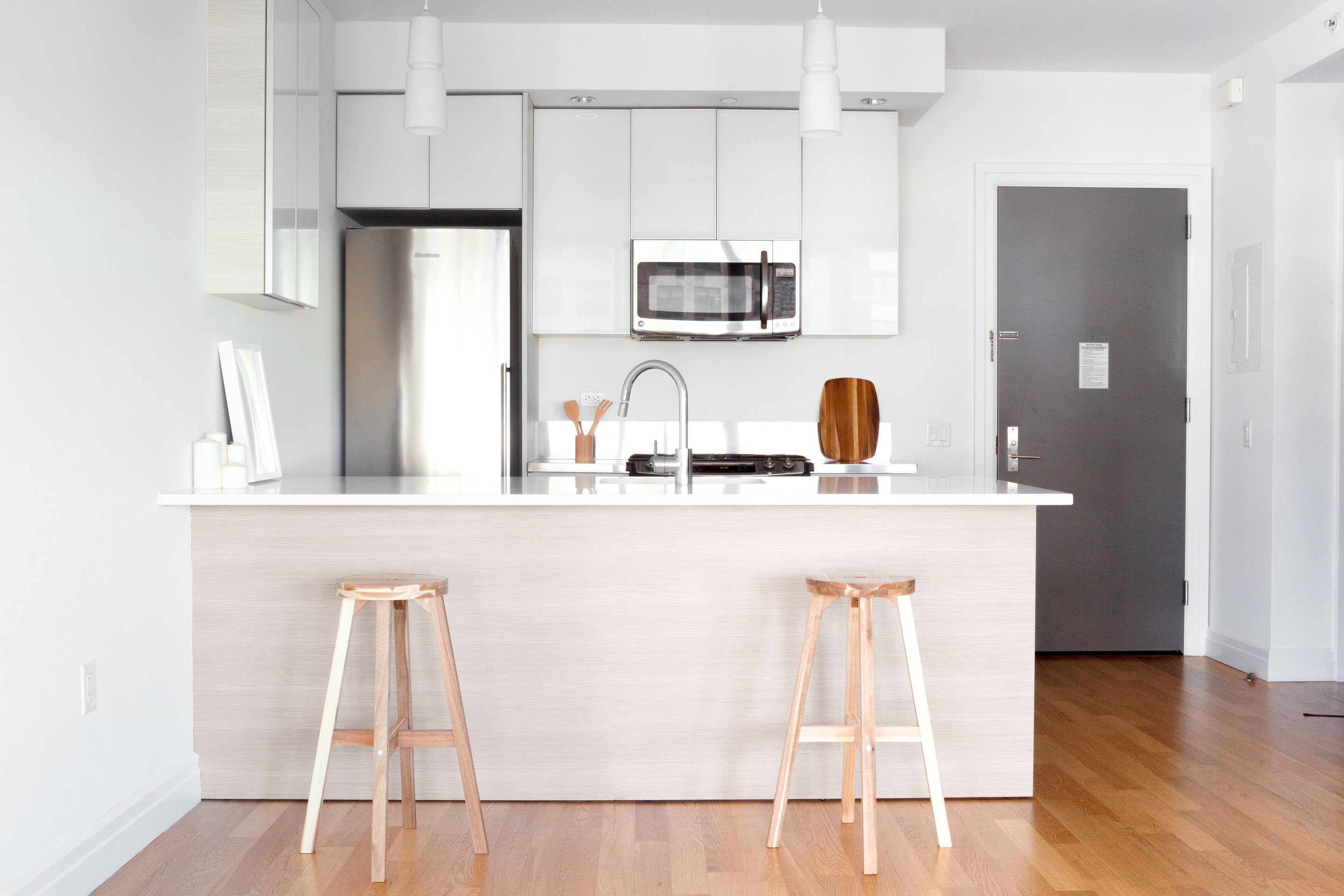 a kitchen with a wooden floor